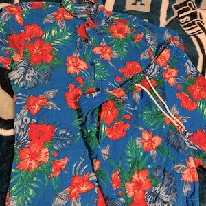 Floral Hawaiian shirt and shorts.